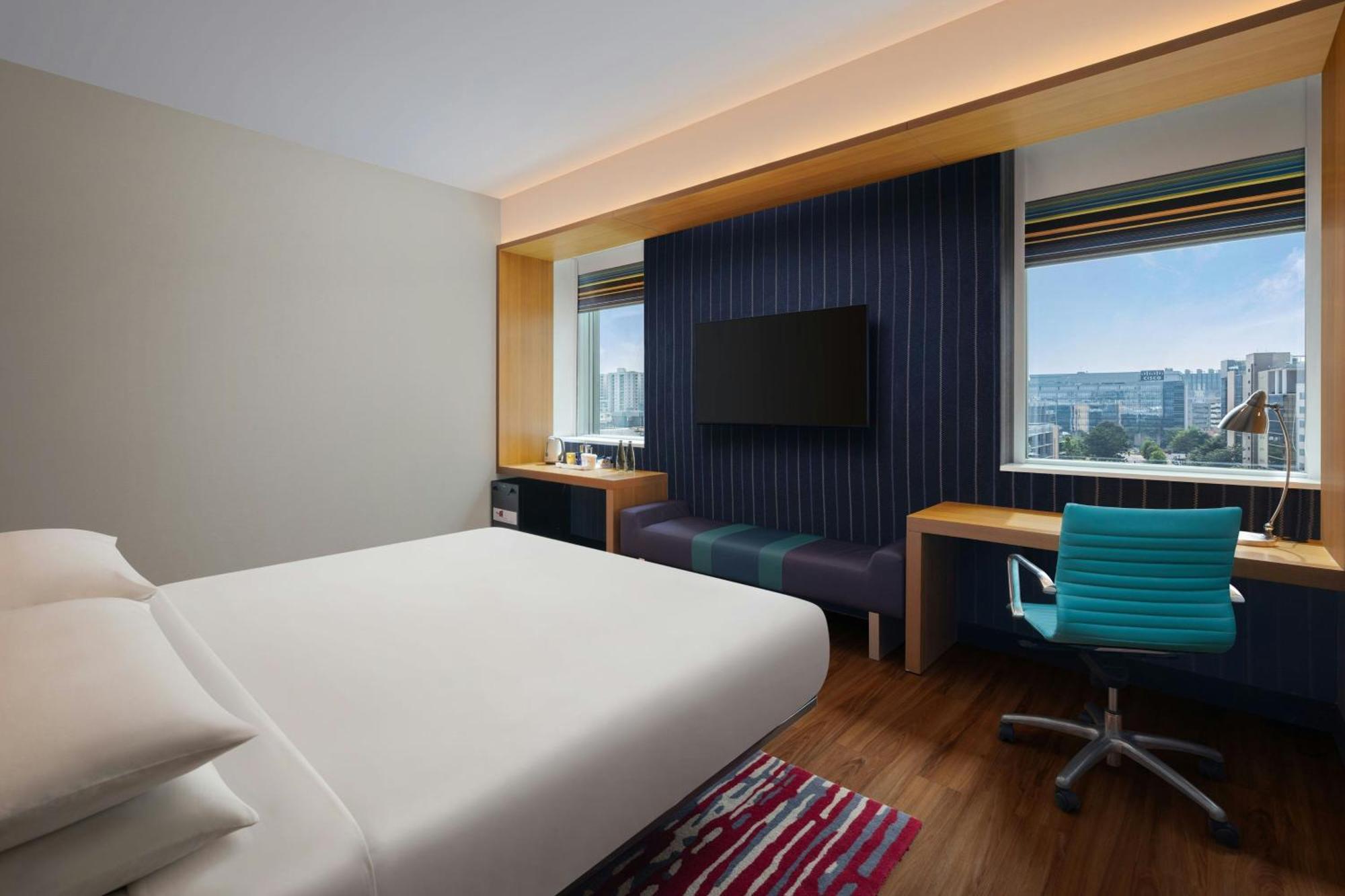Отель Aloft Bengaluru Outer Ring Road Экстерьер фото